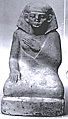 Statuette of a squatting man, Indurated limestone