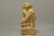 Statue of an asymmetrically seated man, Yellow limonite (G.L.Finlay)