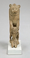 Statuette of lion holding a Nubian captive, Wood