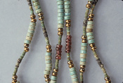 Hepy, String of beads, Faience, paste, garnet, restored bronze