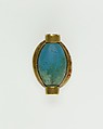 Cowroid Set in a Ring Bezel, Gold, glassy faience