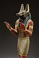 Statuette of a canid-headed god, probably Anubis, Plastered and painted wood