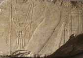 Relief Depicting a Seated Official Wearing a Bat-Emblem, Limestone, paint