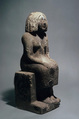 Seated woman, Sandy fossiliferous limestone