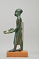 Priest with vase and censer, Leaded bronze, gold leaf on censer and vessel