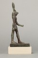 An ancient base asking blessings from Heka for the Scribe of the Library of Atum Pa-kap, son of the Prophet of Atum Pa-iry-kap and the mistress of the House Hr-ib-Wadjet; statue modern above the ankles, Bronze, precious metal inlay