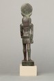 An ancient base asking blessings from Heka for the Scribe of the Library of Atum Pa-kap, son of the Prophet of Atum Pa-iry-kap and the mistress of the House Hr-ib-Wadjet; statue modern above the ankles, Bronze, precious metal inlay