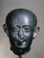 Head of a male priest, Greywacke or diorite