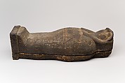 Coffin and corn mummy with Osiris mask, coffin: wood, paint 
mummy: grain, sand, clay and/or soil, resin, linen bandages 
mask: wax