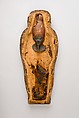 Coffin and corn mummy with Osiris mask, coffin: wood, paint 
mummy: grain, sand, clay and/or soil, resin, linen bandages 
mask: wax