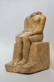 Seated man, Limestone