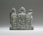 Group statuette of two men and a woman, Steatite