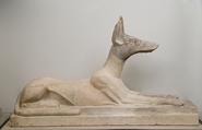 Recumbent Anubis, Limestone, originally painted black