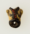 Amulet in form of human face, Glass