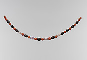 String of beads, Carnelian, amethyst, garnet, hematite; modern string