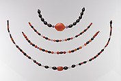 String of beads with scarab, Carnelian, amethyst, garnet, hematite; modern string