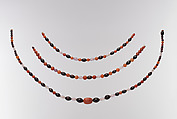 String of beads with scarab, Carnelian, amethyst, garnet, hematite; modern string
