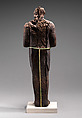 Shabti of Amenhotep III, Ebony; eyes inlaid with blue, white, black glass;  inscription filled with pigment