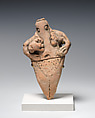 Female figure holding infant, Terracotta