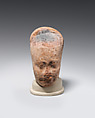Head of female figure, Pottery