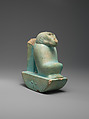 Figure of baboon on a basket and with a pillar (<em>shebet</em> offering), Faience, pale blue glaze
