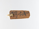 Mummy label, Wood