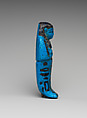 Shabti of the Adoratrice of Hathor Henettawy, wife of Painedjem I, Faience