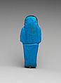 Shabti of the Adoratrice of Hathor Henettawy, wife of Painedjem I, Faience