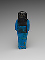 Shabti of the Adoratrice of Hathor Henettawy, wife of Painedjem I, Faience