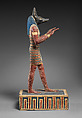 Statuette of a canid-headed god, probably Anubis, Plastered and painted wood