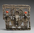Pectoral with bovine head crowned with disk, horns and feathers, Cupreous metal, carnelian