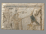 Lintel depicting Horus offering an <em>ankh</em> sign to the Horus name of King Amenemhat I, Limestone, paint