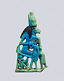 Lion-headed goddess suckling the king, Faience
