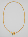 Chain terminating in a leaf motif, and having a raised openwork clasp ornament, gold, blue stone, emerald