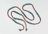 String of Beads with Feline-head Amulets, Gold, Egyptian blue