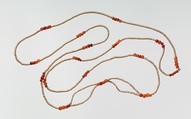 Girdle of disc and ball beads, Travertine (Egyptian alabaster), carnelian
