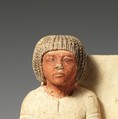 Statue of two men and a boy that served as a domestic icon, Limestone, paint