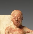 Statue of two men and a boy that served as a domestic icon, Limestone, paint