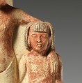 Statue of two men and a boy that served as a domestic icon, Limestone, paint