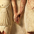 Statue of two men and a boy that served as a domestic icon, Limestone, paint