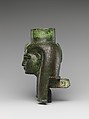 Head of a goddess, probably Mut, for attachment to a processional barque (?), Cupreous metal, gold leaf, formerly inlaid