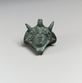 Decorative attachment in the form of a head wearing an elephant headdress, Bronze