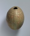 Relief-decorated Lentoid Bottle ("New Year's Bottle"); Horus falcon in marshes on one side; cow goddess in marshes on the other, Faience