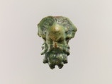 Head of a satyr for attachment to a jug, Faience