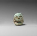 Figure of a Crouched Man, Faience