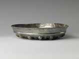 Bowl with bosses and petals, Silver