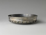 Bowl with bosses and lotus pattern and demotic weight on rim, Silver