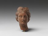 Head of a woman, Pottery