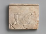 Relief  plaque with Vulture and Cobra on baskets; falcon on opposite, Limestone