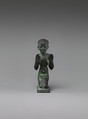 Statuette of an adorant from a group with a god, Cupreous metal